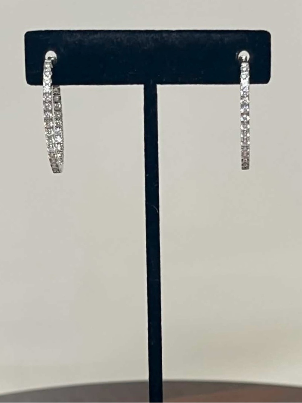 Prime Art & Jewel  Sterling Silver Cubic Zirconia Inside-Out Oval Hoop Earrings
